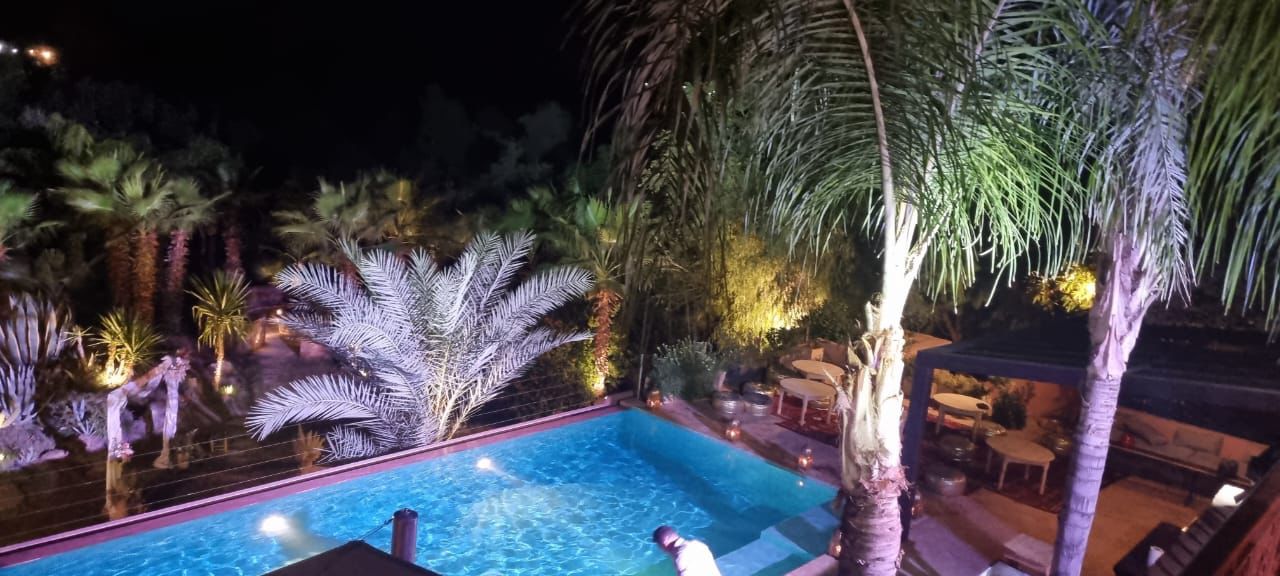 Evening pool area with magical lighting