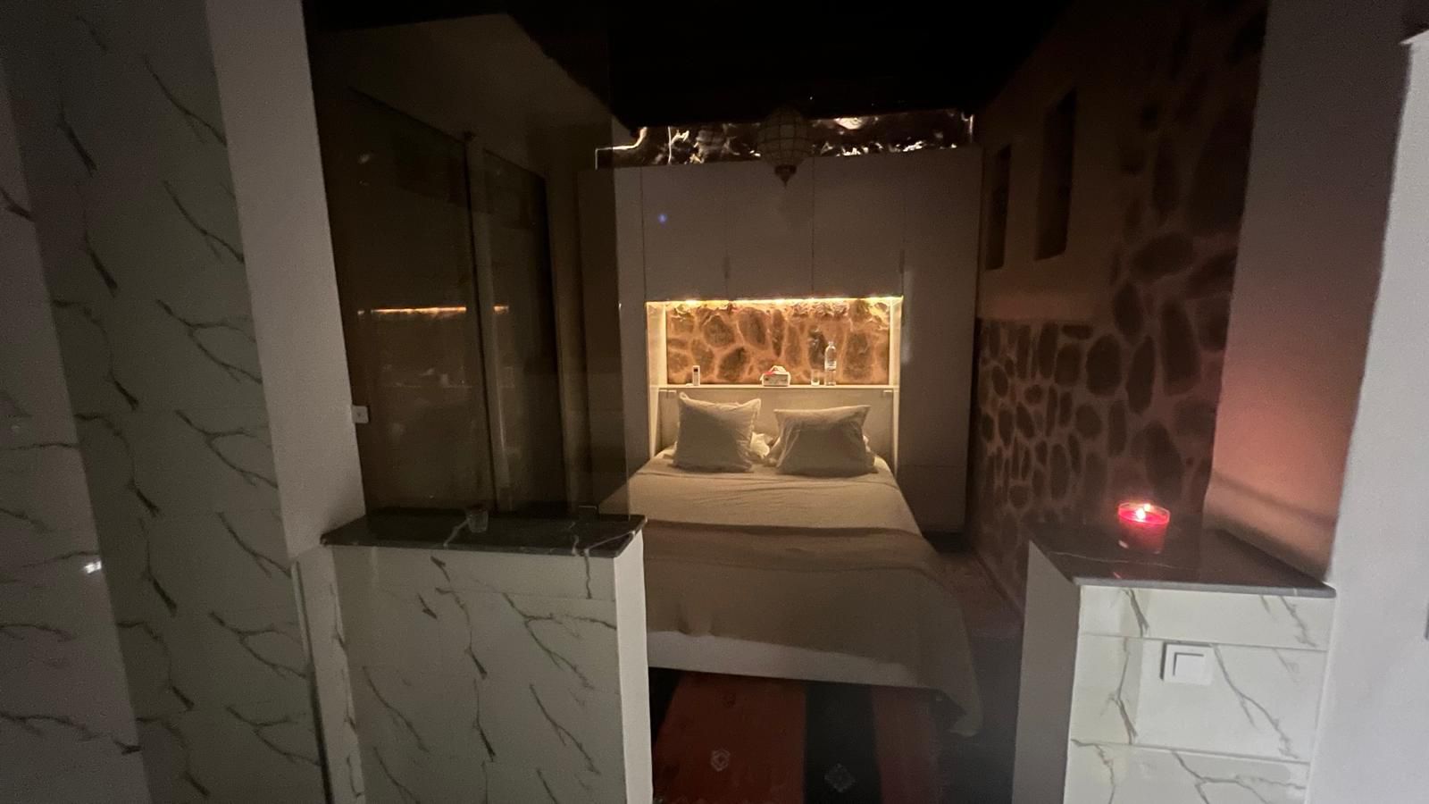 Marble Room with queen-size bed and garden view